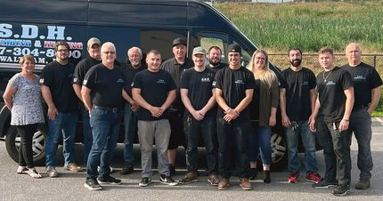 S.D.H. Plumbing & Heating service vehicle or team